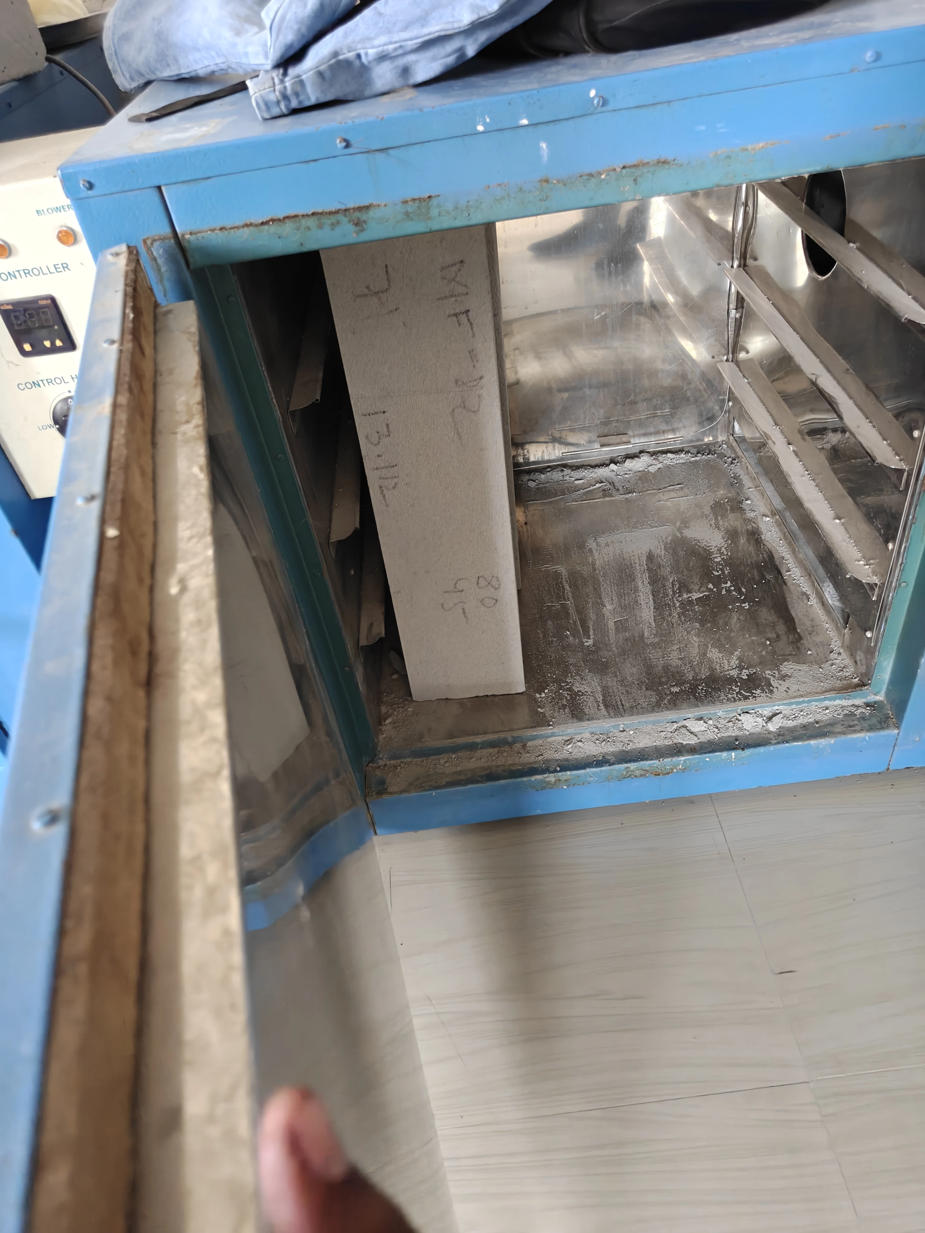 AAC block specimen inside a laboratory testing oven