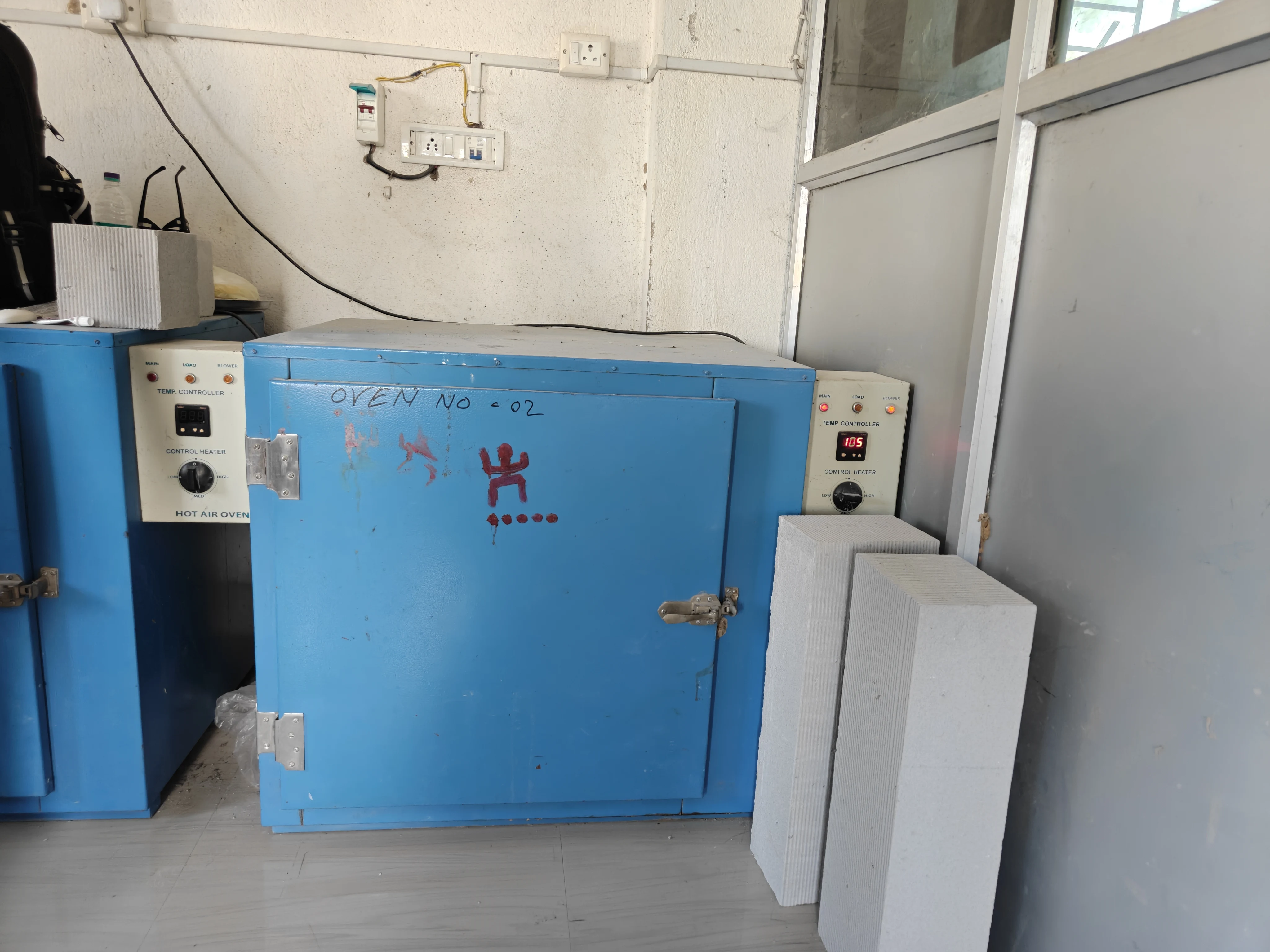 Row of testing ovens inside the Klavetek lab