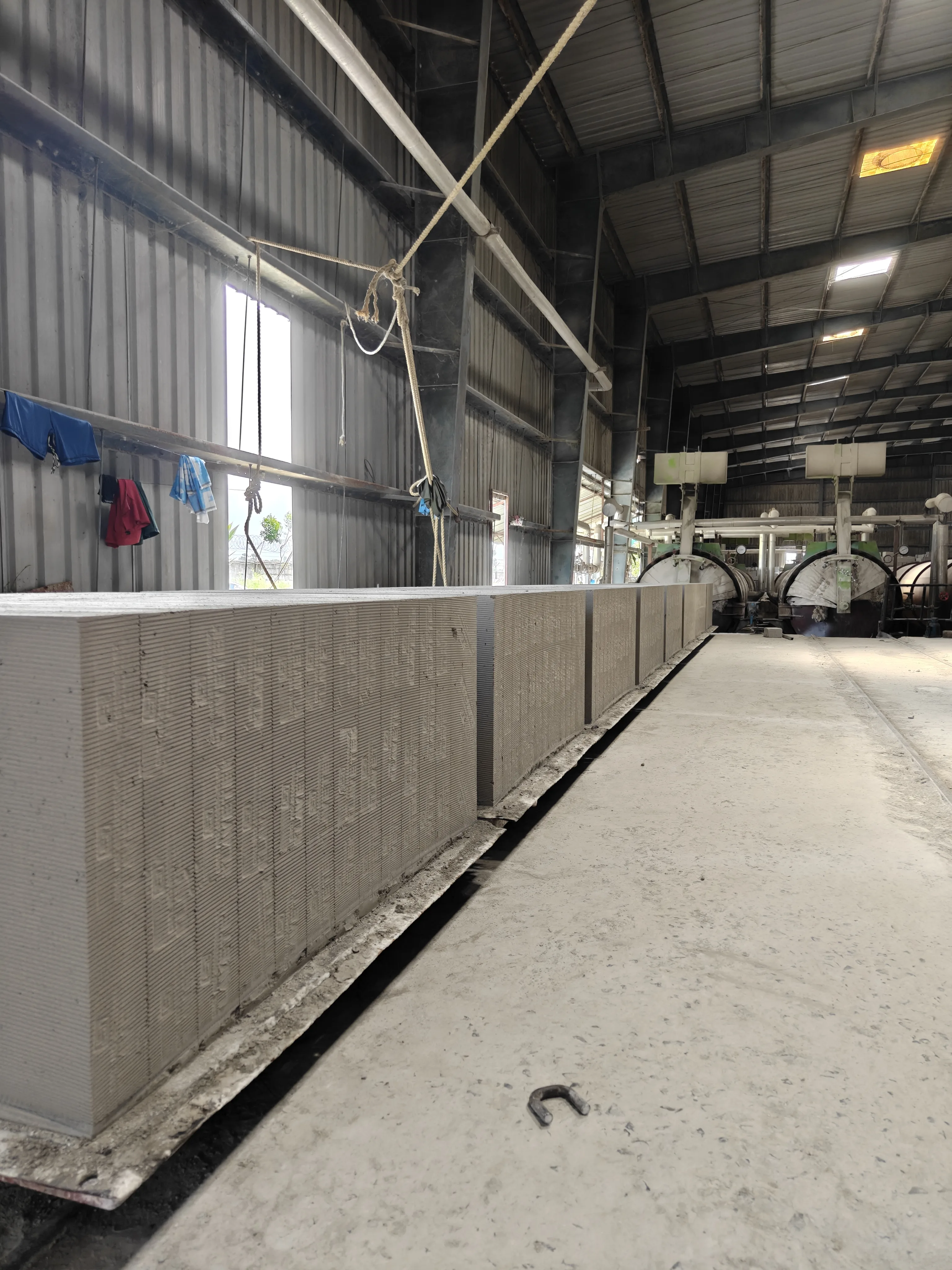 Cakes travelling on rails towards the autoclaves